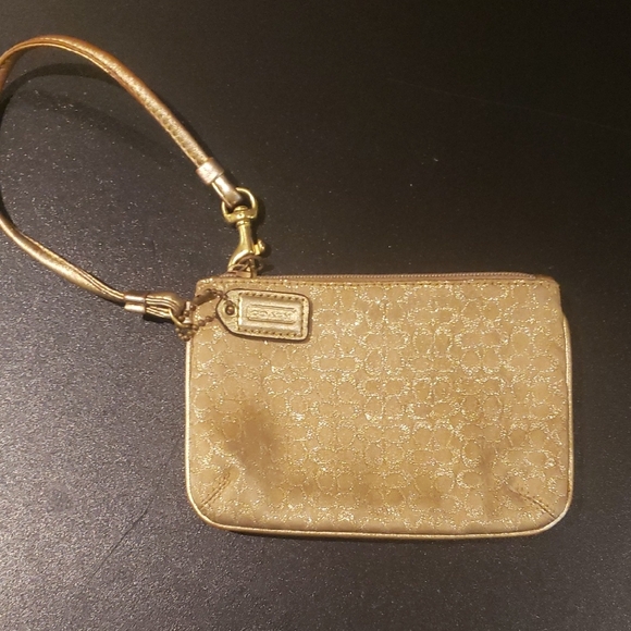 Coach Handbags - Coach Gold Wristlet Clutch